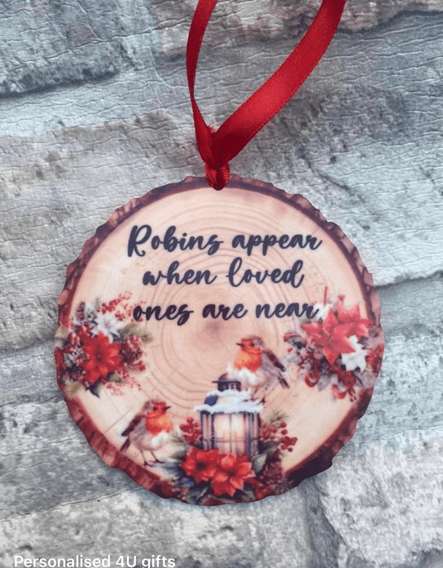 Robins appear hanging bauble